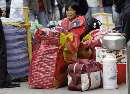 Imigrantę iš Kinijos išvijo vis gilėjanti ekonominė krizė | Reuters/Scanpix