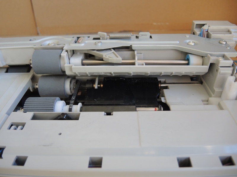 Lazerinio printerio popieriaus padavimo mechanizmas.